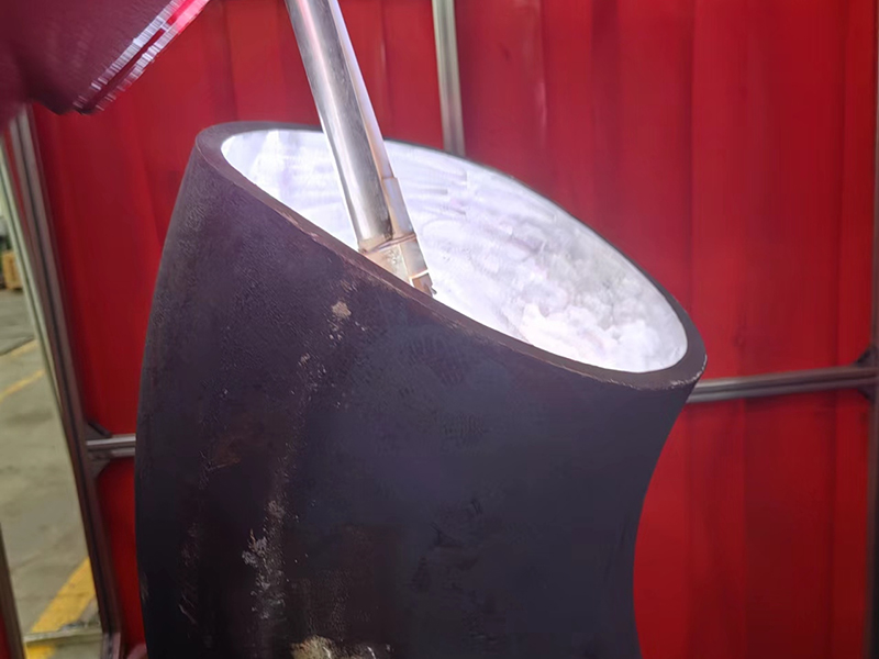  90 degree long radius cladded elbow with nickel-based alloy 625 weld overlay