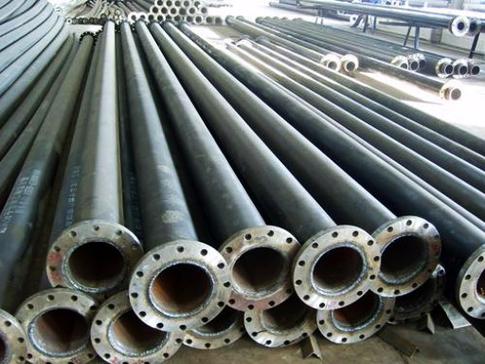 Mining pipeline flanged pipes protected with abrasion resistant cladding