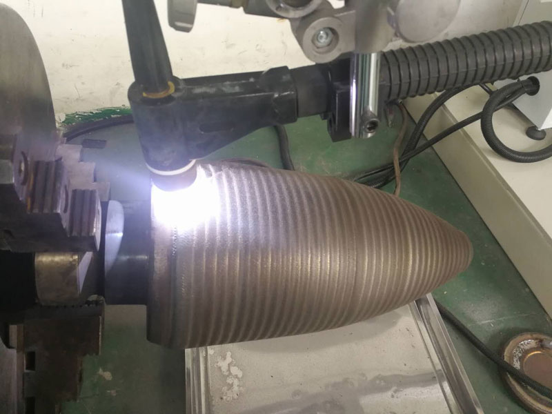 Plasma powder hardfacing process applied to piercing plug for high temperature and wear resistance