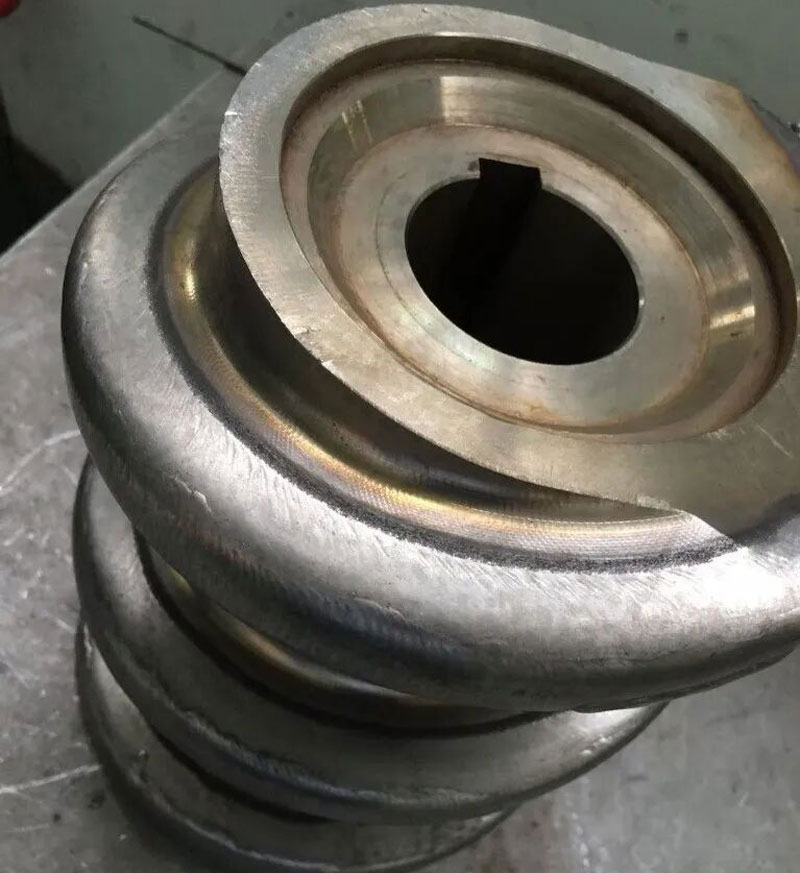 Plasma cladding solution for extrusion screw in high load processing equipment