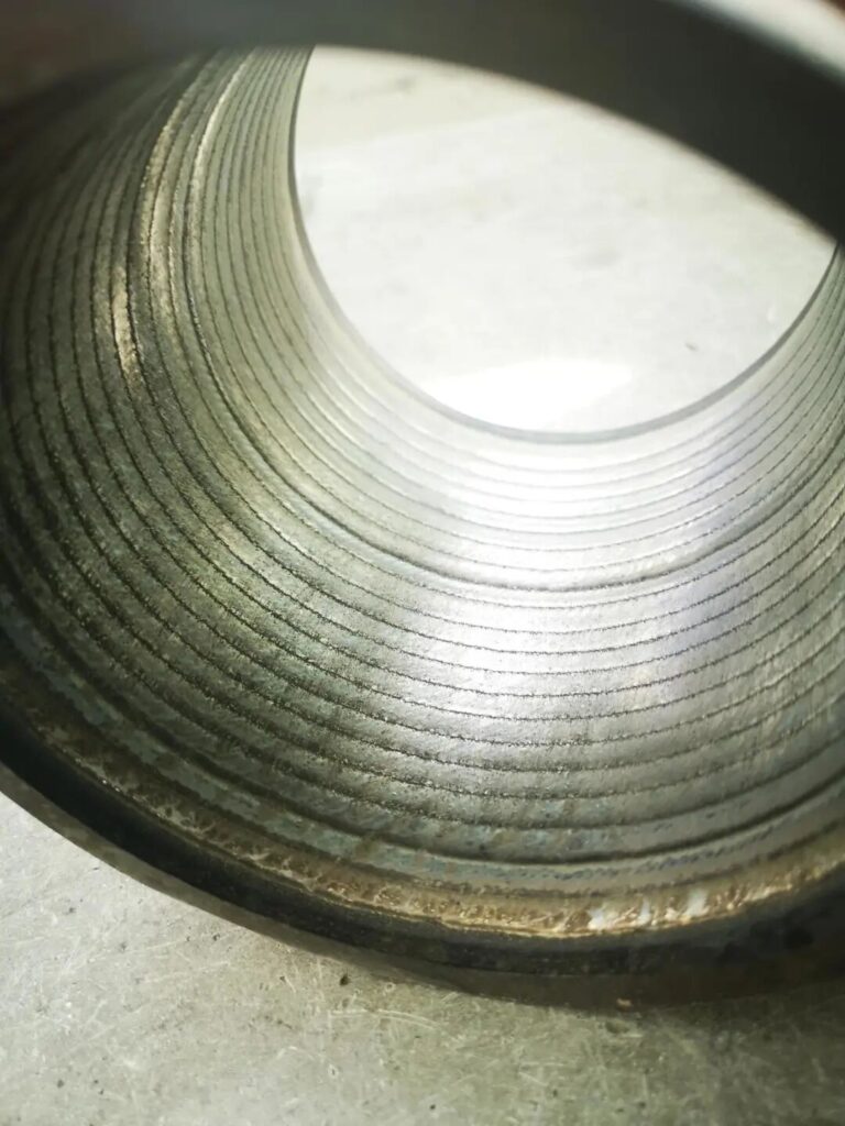 Internal bore plasma cladding repair for valve inner surface